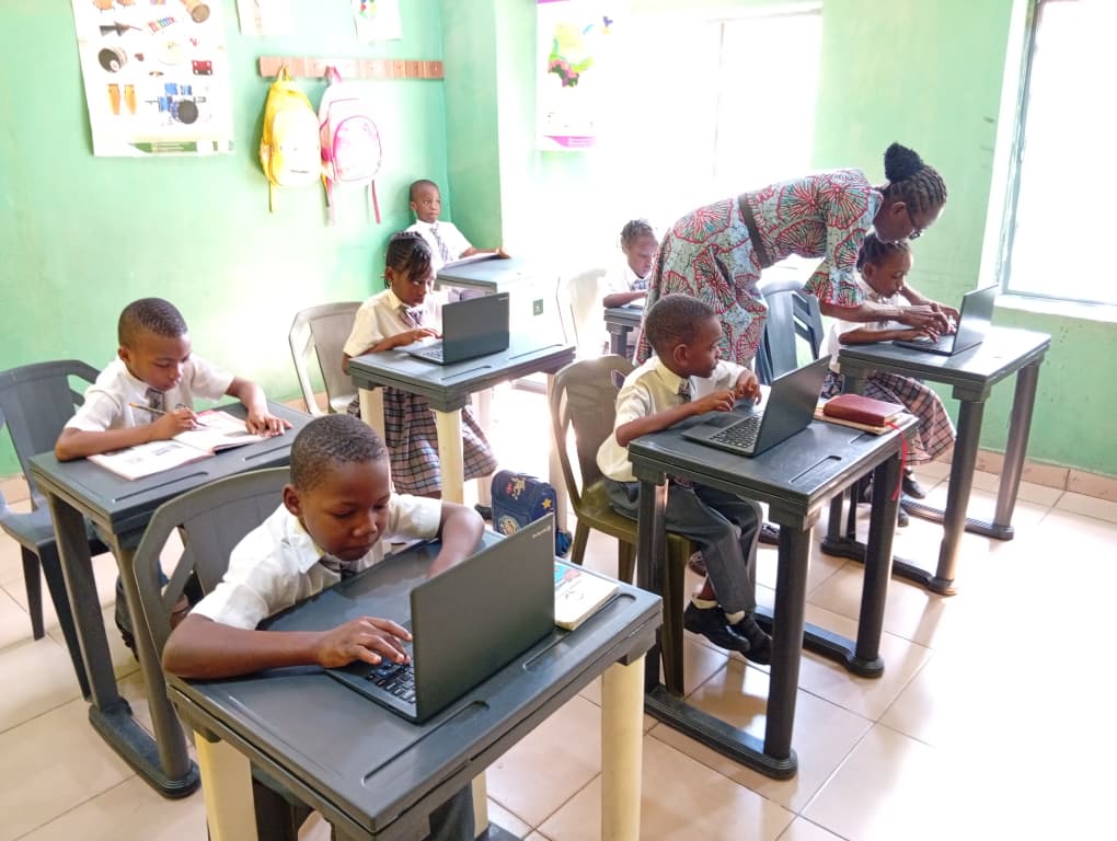 Students working on laptops in the digital learning classroom